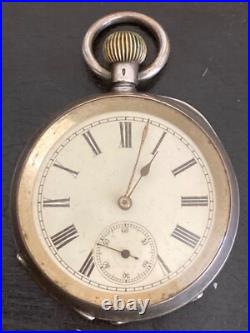 Antique Kendal & Dent stem wind pocket watch in 0.935 sterling silver case -Runs