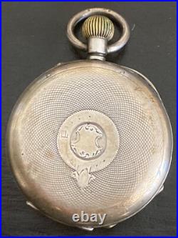 Antique Kendal & Dent stem wind pocket watch in 0.935 sterling silver case -Runs