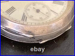 Antique Kendal & Dent stem wind pocket watch in 0.935 sterling silver case -Runs