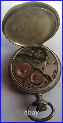 Tavannes pocket watch silver & niello hunter carved case 43 mm.in diameter