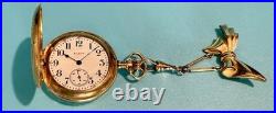 Vintage Elgin pocket watch with ornate case & bow fob early 1900s collectible