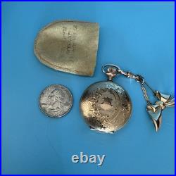 Vintage Elgin pocket watch with ornate case & bow fob early 1900s collectible