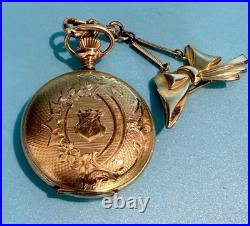 Vintage Elgin pocket watch with ornate case & bow fob early 1900s collectible