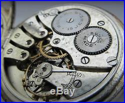 Vintage open faced silver cased Rolex pocket watch