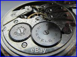 Vintage open faced silver cased Rolex pocket watch